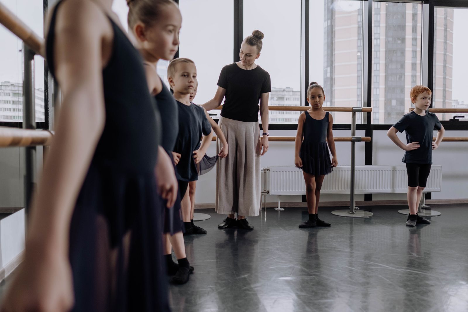 A class in progress with the teacher watching